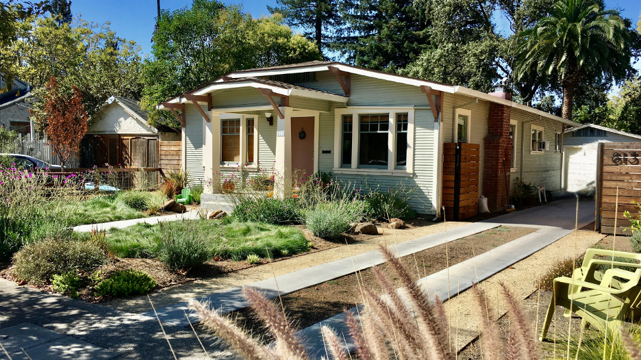 a house with a garden and a driveway